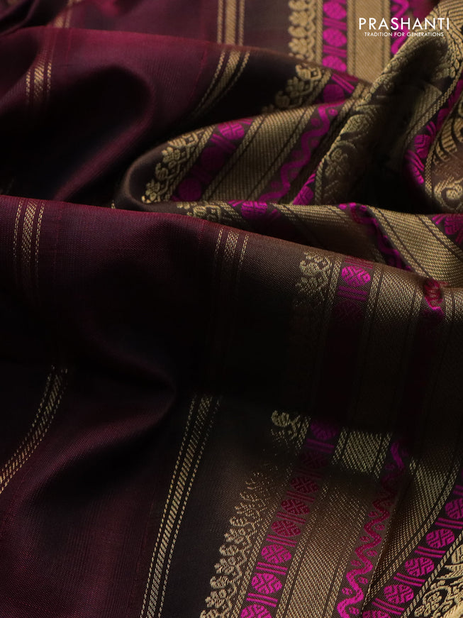 Pure kanchipuram silk saree wine shade and brown with zari woven buttas and annam & temple design zari border