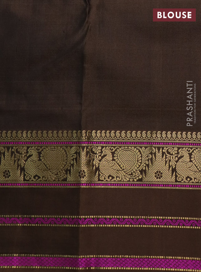 Pure kanchipuram silk saree wine shade and brown with zari woven buttas and annam & temple design zari border