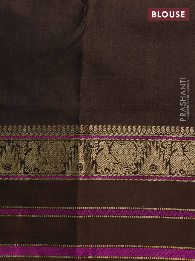 Pure kanchipuram silk saree wine shade and brown with zari woven buttas and annam & temple design zari border