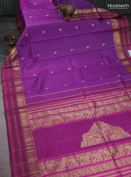 Pure kanchipuram silk saree purple with zari woven buttas and annam & temple design zari border