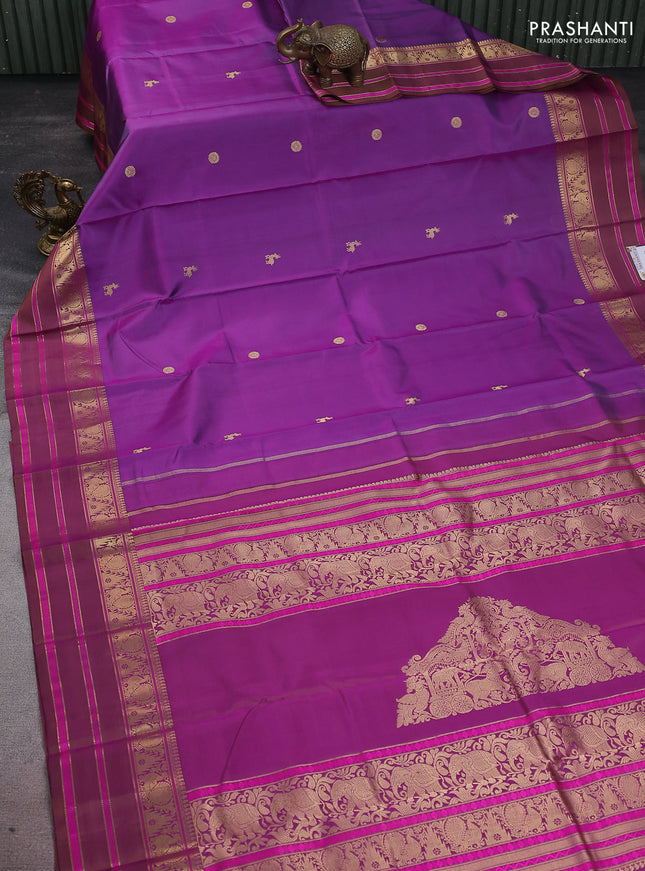 Pure kanchipuram silk saree purple with zari woven buttas and annam & temple design zari border