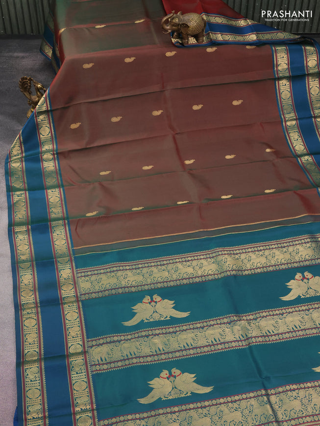 Pure kanchipuram silk saree dual shade of manthulir green and dual shade of peacock blue with zari woven buttas and rettapet zari woven border