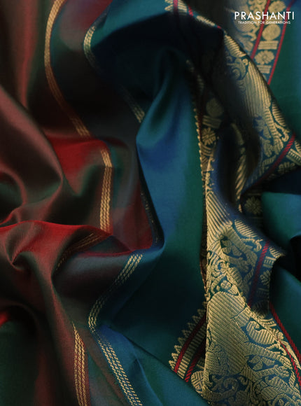 Pure kanchipuram silk saree dual shade of manthulir green and dual shade of peacock blue with zari woven buttas and rettapet zari woven border