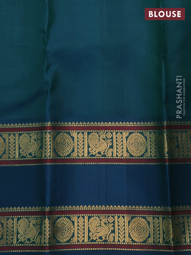 Pure kanchipuram silk saree dual shade of manthulir green and dual shade of peacock blue with zari woven buttas and rettapet zari woven border