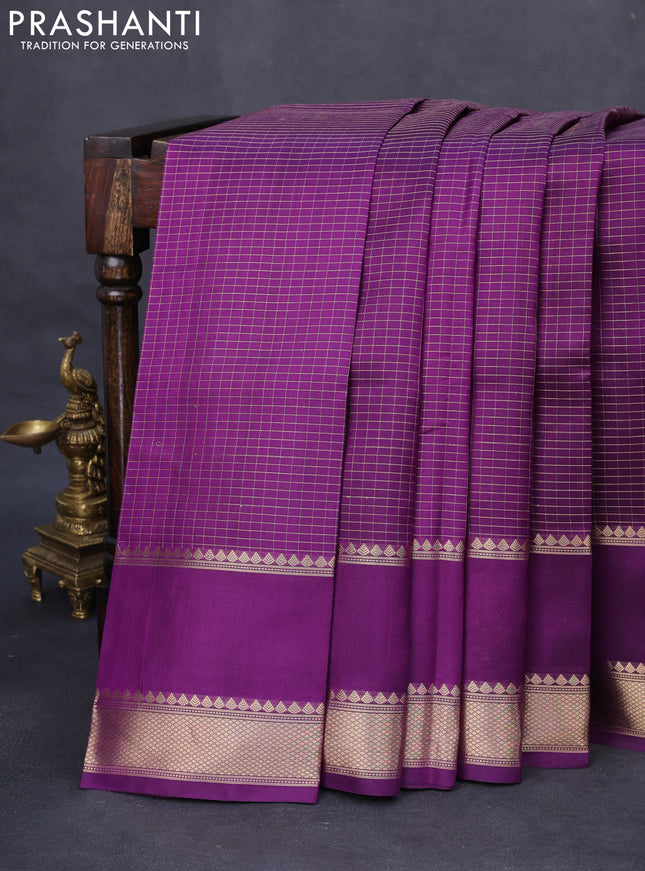 Pure kanchipuram silk saree purple with allover zari woven checked pattern and rettapet zari woven butta border