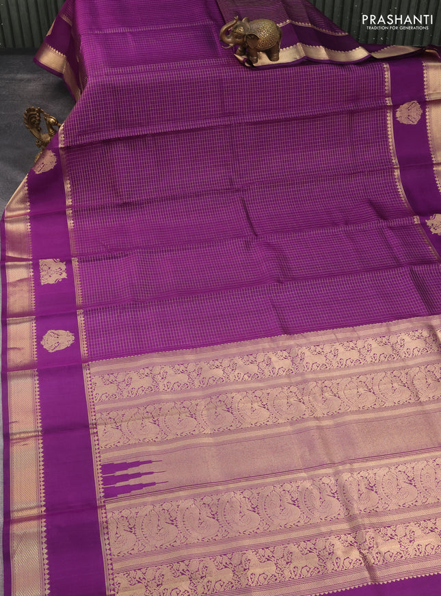 Pure kanchipuram silk saree purple with allover zari woven checked pattern and rettapet zari woven butta border