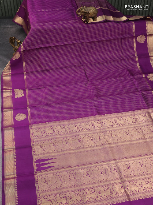 Pure kanchipuram silk saree purple with allover zari woven checked pattern and rettapet zari woven butta border