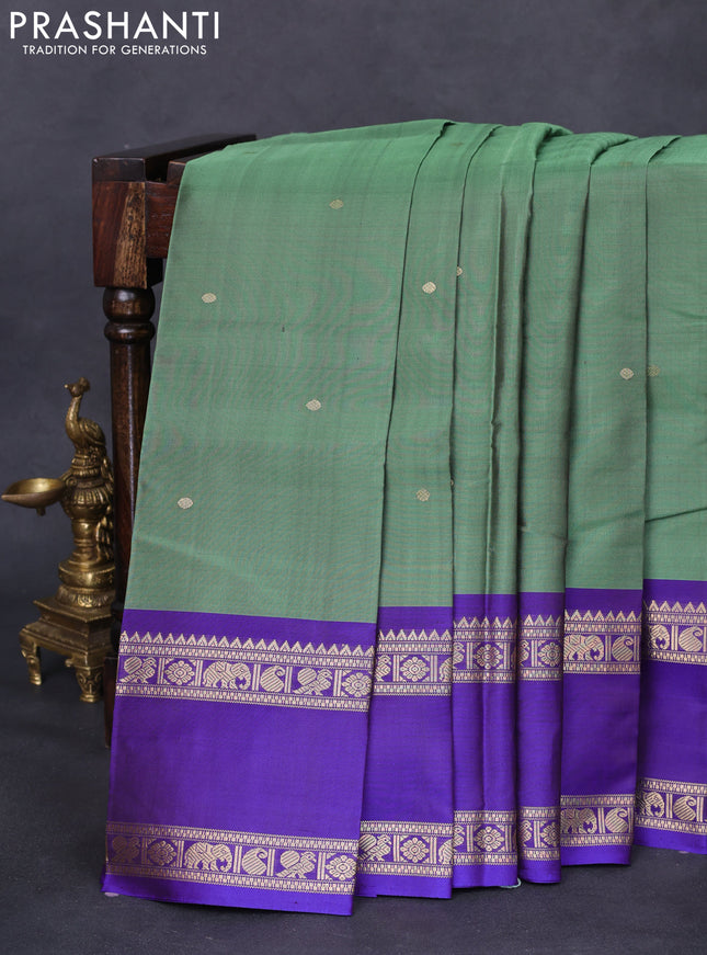 Pure kanchipuram silk saree green and blue with zari woven buttas and rettapet zari woven border