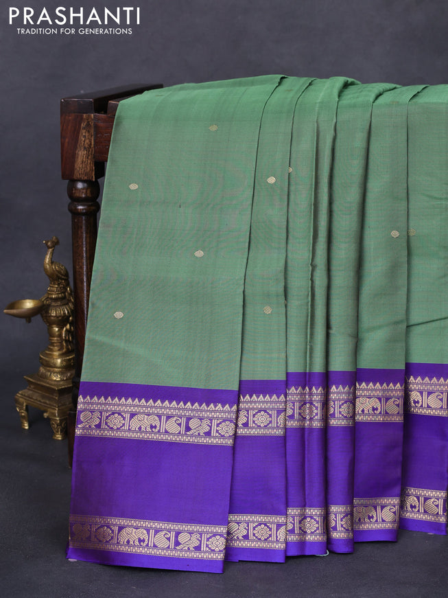 Pure kanchipuram silk saree green and blue with zari woven buttas and rettapet zari woven border