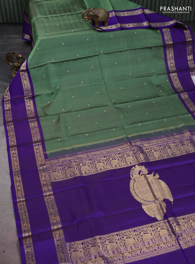 Pure kanchipuram silk saree green and blue with zari woven buttas and rettapet zari woven border