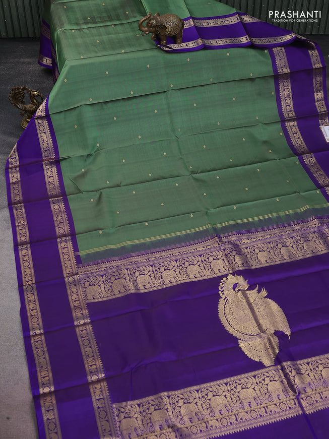 Pure kanchipuram silk saree green and blue with zari woven buttas and rettapet zari woven border