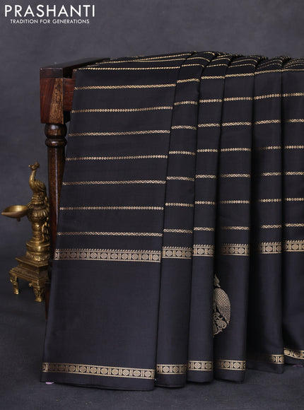Pure kanchipuram silk saree black with allover zari woven veldhari weaves and long rettapet zari woven border
