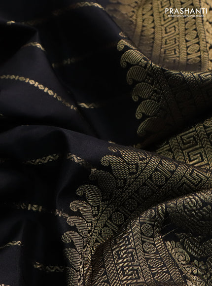 Pure kanchipuram silk saree black with allover zari woven veldhari weaves and long rettapet zari woven border