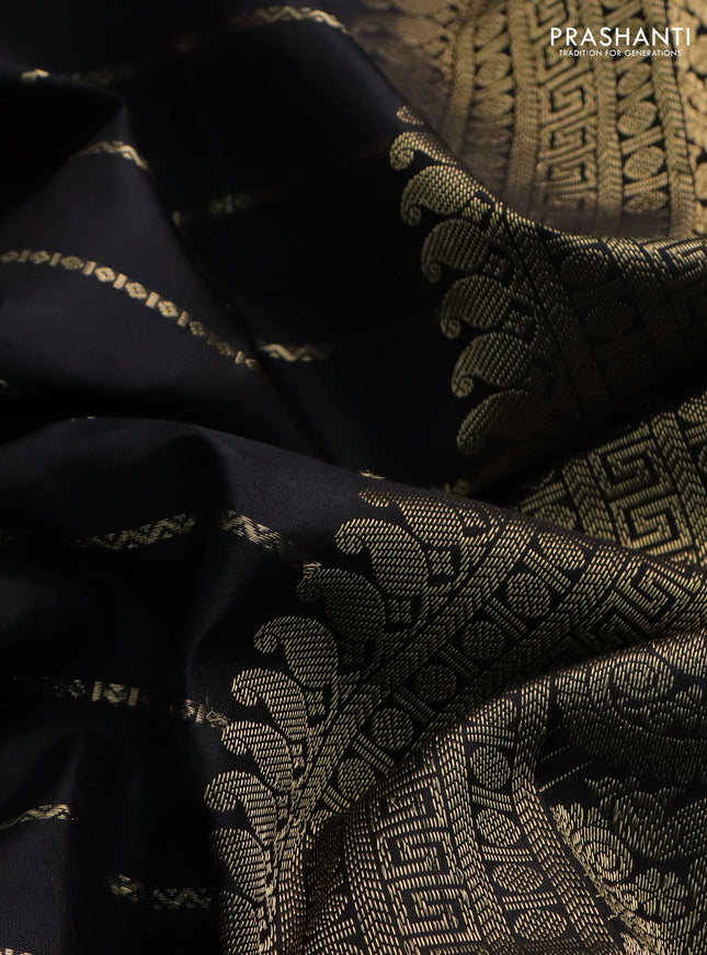Pure kanchipuram silk saree black with allover zari woven veldhari weaves and long rettapet zari woven border