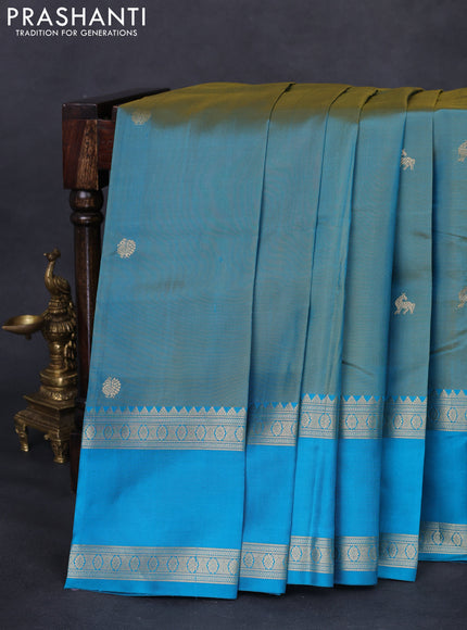 Pure kanchipuram silk saree dual shade of teal bluish green and teal blue with zari woven buttas and long rettapet zari woven border