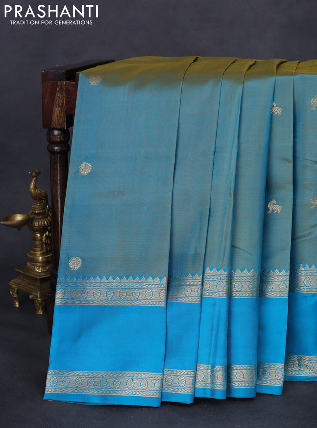Pure kanchipuram silk saree dual shade of teal bluish green and teal blue with zari woven buttas and long rettapet zari woven border