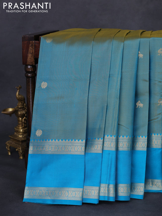 Pure kanchipuram silk saree dual shade of teal bluish green and teal blue with zari woven buttas and long rettapet zari woven border
