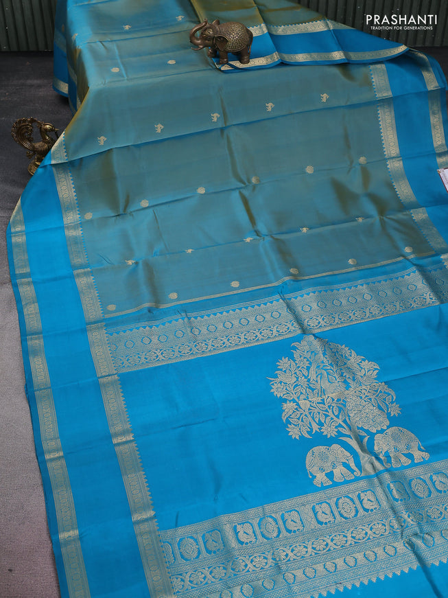Pure kanchipuram silk saree dual shade of teal bluish green and teal blue with zari woven buttas and long rettapet zari woven border