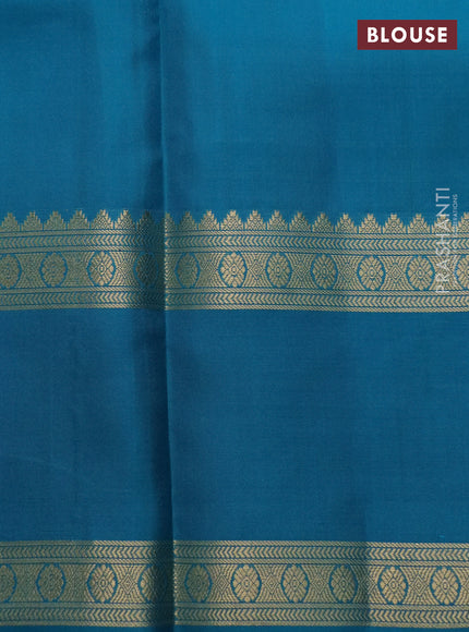 Pure kanchipuram silk saree dual shade of teal bluish green and teal blue with zari woven buttas and long rettapet zari woven border