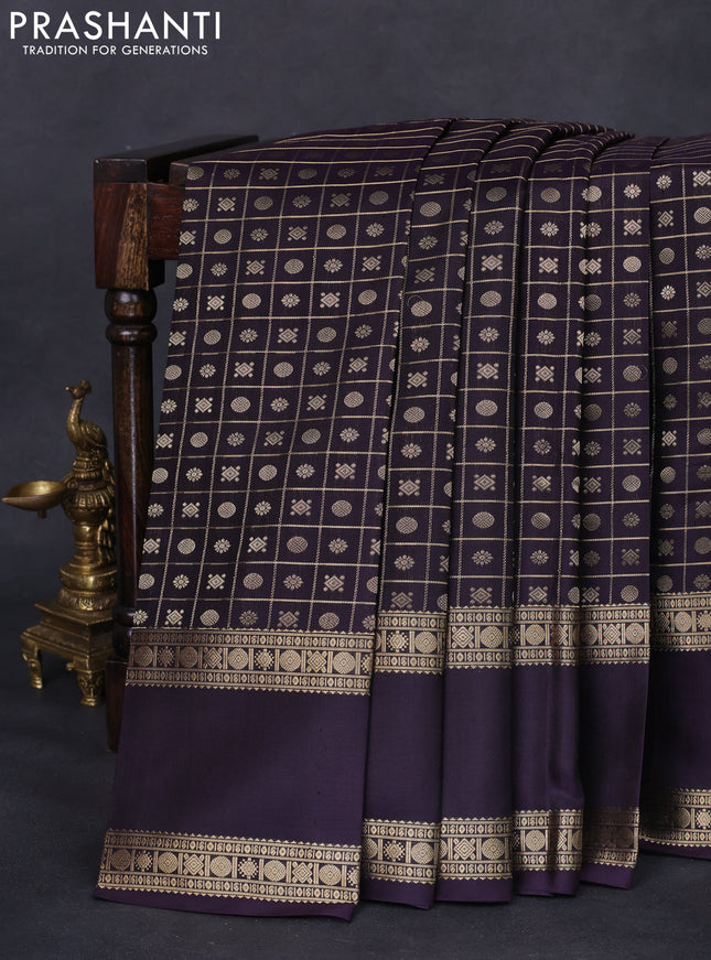 Pure kanchipuram silk saree deep jamun with allover zari checks & buttas and long rettapet zari woven border