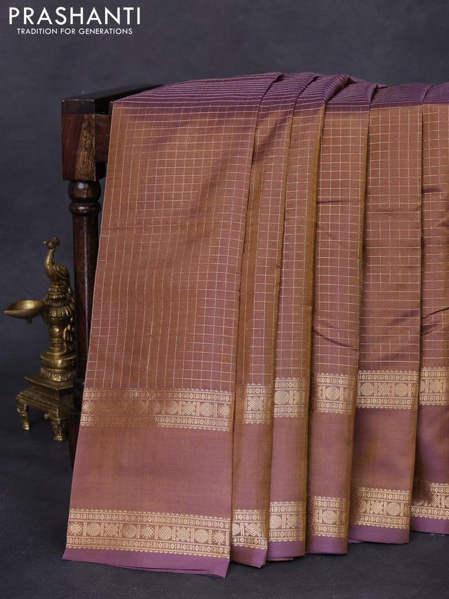 Pure kanchipuram silk saree dual shade of mehendi green and violet with allover zari woven checked pattern and rettapet zari woven border