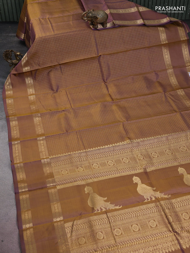 Pure kanchipuram silk saree dual shade of mehendi green and violet with allover zari woven checked pattern and rettapet zari woven border