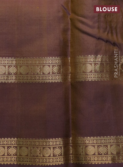 Pure kanchipuram silk saree dual shade of mehendi green and violet with allover zari woven checked pattern and rettapet zari woven border