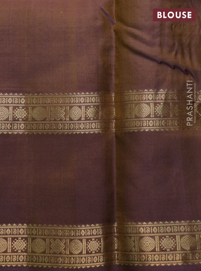 Pure kanchipuram silk saree dual shade of mehendi green and violet with allover zari woven checked pattern and rettapet zari woven border