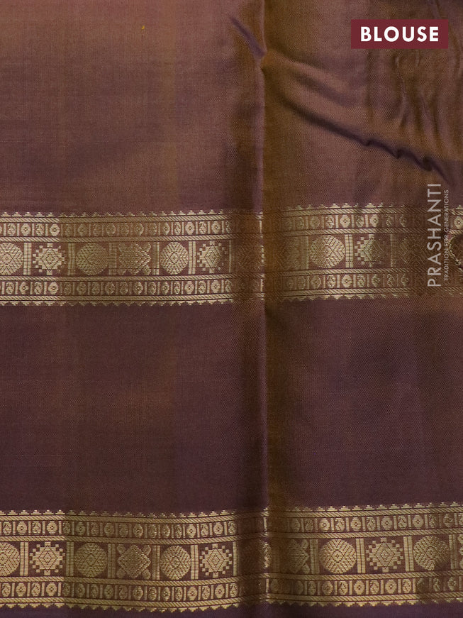 Pure kanchipuram silk saree dual shade of mehendi green and violet with allover zari woven checked pattern and rettapet zari woven border