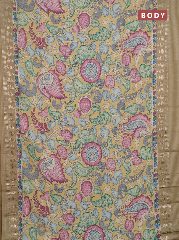 Semi tussar saree yellow shade and cream with allover kalamkari prints and zari woven border