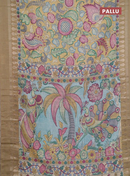 Semi tussar saree yellow shade and cream with allover kalamkari prints and zari woven border