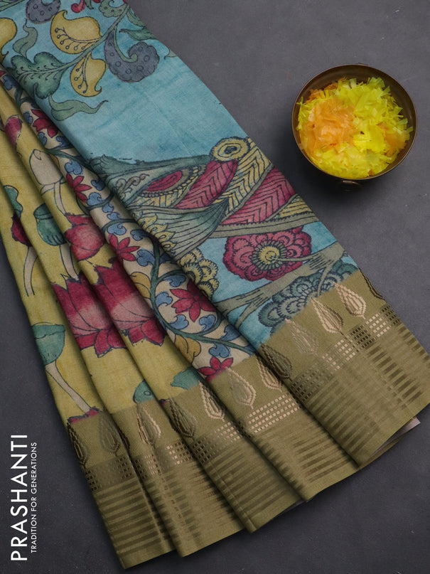 Semi tussar saree yellow shade and elaichi green with allover kalamkari prints and zari woven border