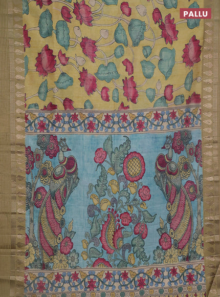 Semi tussar saree yellow shade and elaichi green with allover kalamkari prints and zari woven border