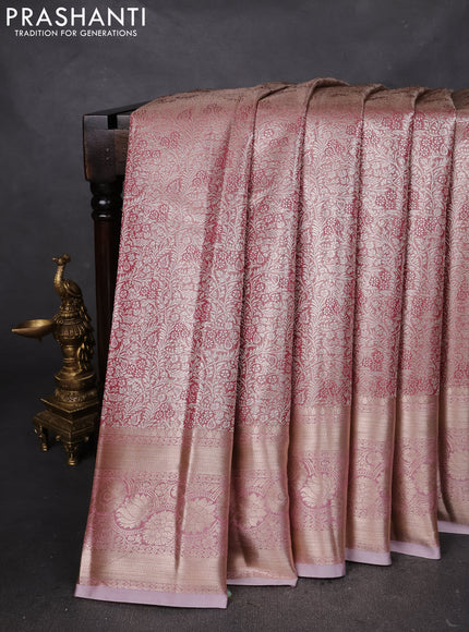 Semi kanchipuram tissue silk saree mauve pink with allover silver zari woven brocade weaves and long zari woven border