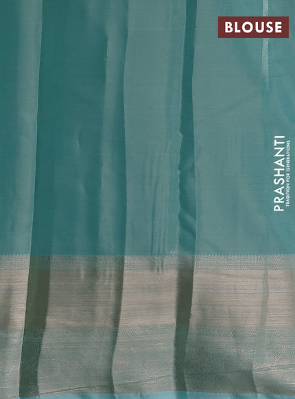 Semi kanchipuram tissue silk saree teal blue with allover silver zari woven brocade weaves and long zari woven border