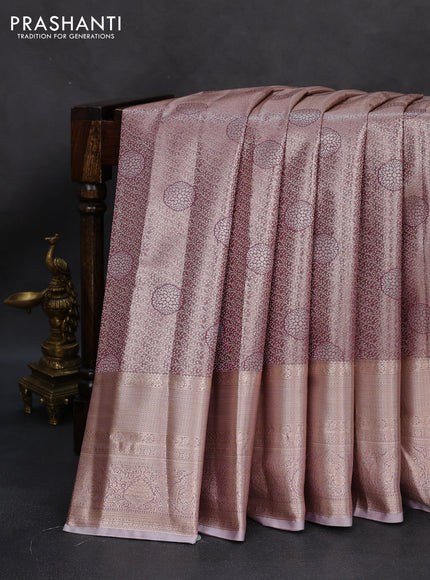 Semi kanchipuram tissue silk saree pastel pink and pastel lavender with allover silver zari woven brocade weaves and long zari woven border