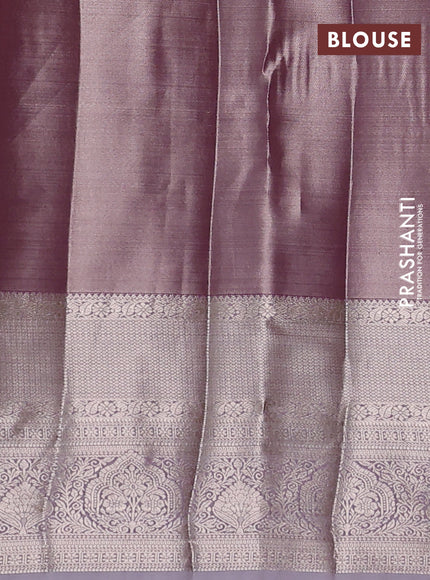 Semi kanchipuram tissue silk saree pastel pink and pastel lavender with allover silver zari woven brocade weaves and long zari woven border
