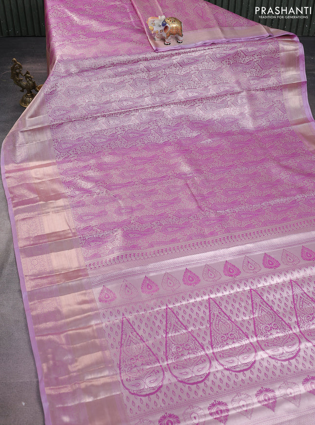 Semi kanchipuram tissue silk saree lavender with allover silver zari woven paisley brocade weaves and long zari woven border