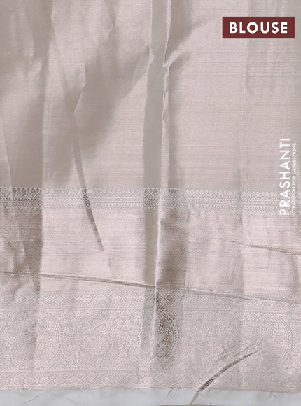 Semi kanchipuram tissue silk saree cream with allover silver zari woven brocade weaves and long zari woven border