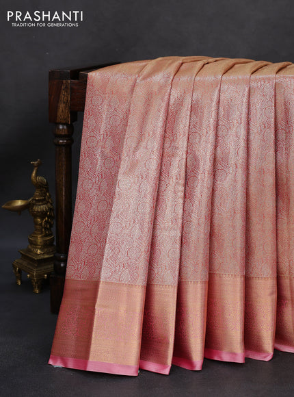 Semi kanchipuram tissue silk saree dual shade of peach and peach pink with allover silver zari woven brocade weaves and zari woven border