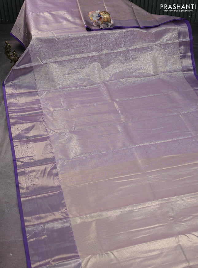 Semi kanchipuram tissue silk saree mild lavender and lavender with allover silver zari woven brocade weaves and long zari woven border