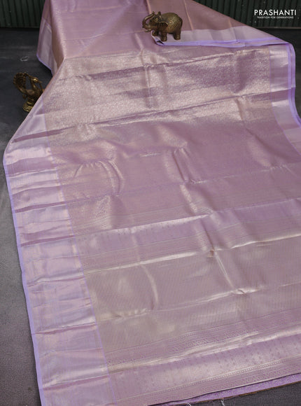 Semi kanchipuram tissue silk saree mild lavender and lavender with allover silver zari woven brocade weaves and long zari woven border