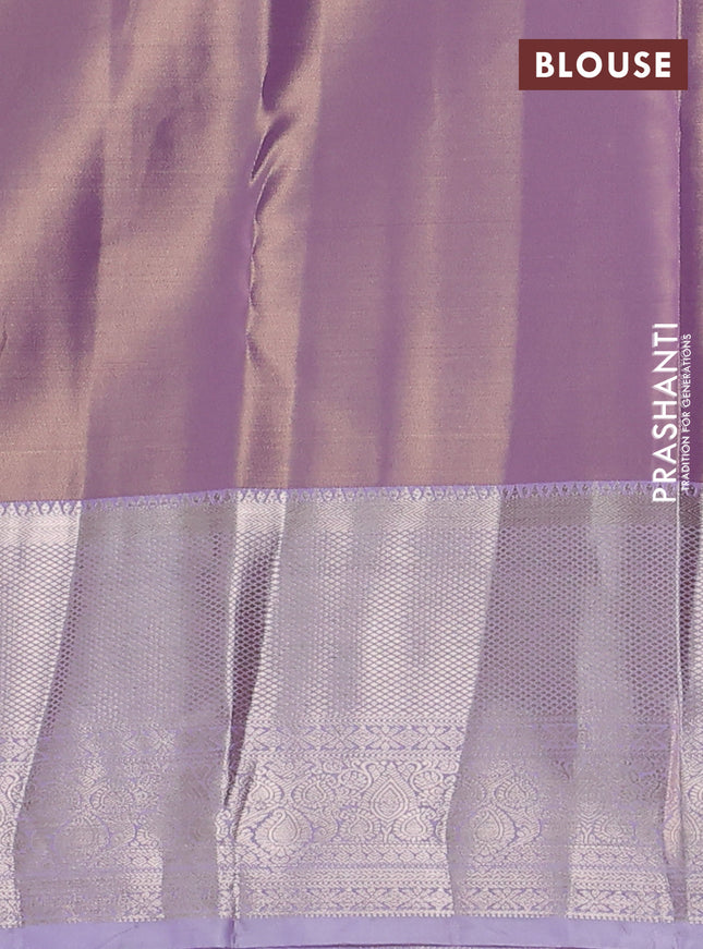 Semi kanchipuram tissue silk saree mild lavender and lavender with allover silver zari woven brocade weaves and long zari woven border