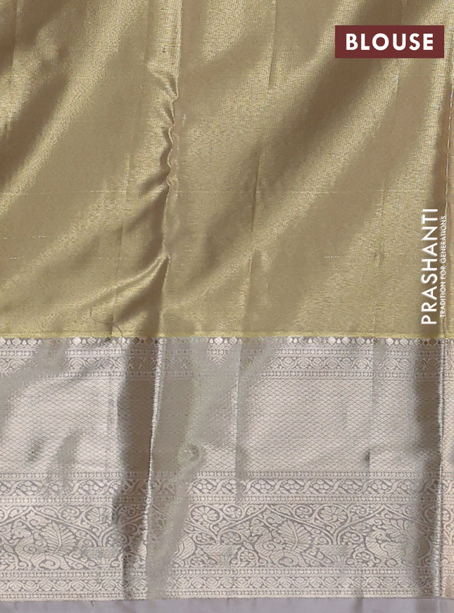 Semi kanchipuram tissue silk saree beige and pastel grey with allover silver zari woven brocade weaves and long zari woven border