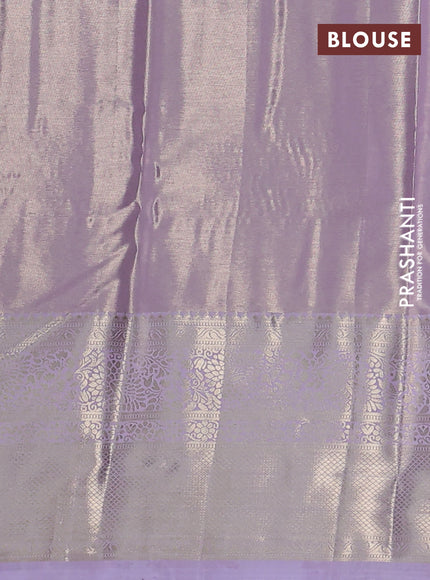 Semi kanchipuram tissue silk saree mild lavender with allover silver zari woven brocade weaves and long zari woven border
