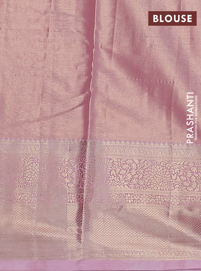 Semi kanchipuram tissue silk saree mild peach pink with allover silver zari woven brocade weaves and long zari woven border