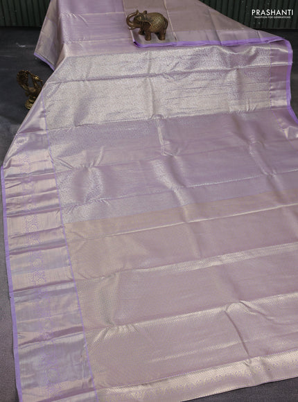 Semi kanchipuram tissue silk saree lavender with allover silver zari woven brocade weaves and zari woven border