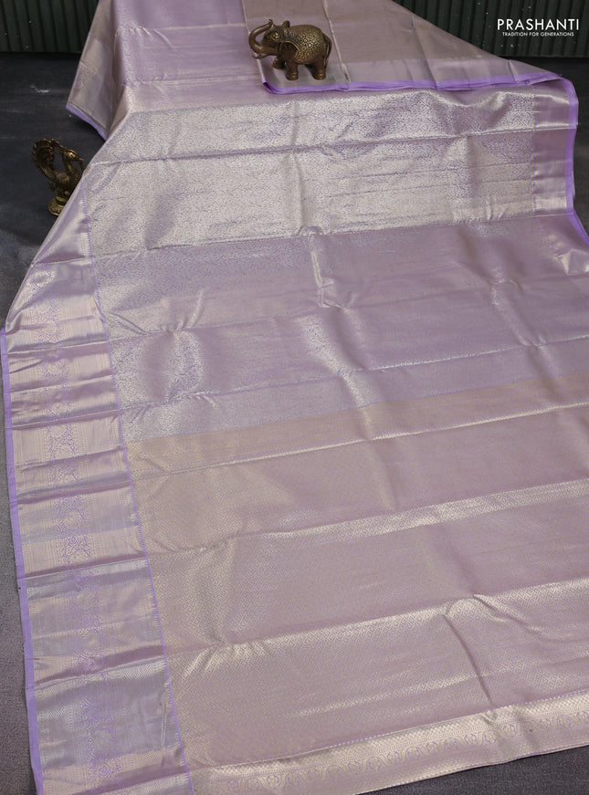 Semi kanchipuram tissue silk saree lavender with allover silver zari woven brocade weaves and zari woven border