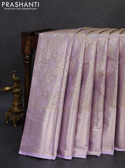 Semi kanchipuram tissue silk saree lavender with allover silver zari woven brocade weaves and zari woven border