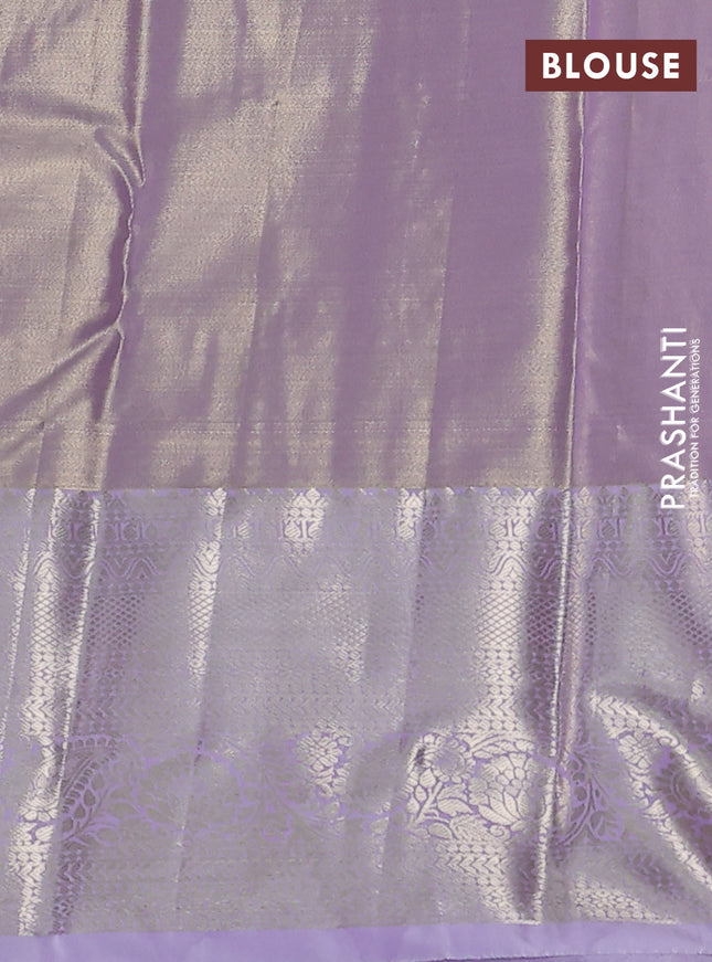 Semi kanchipuram tissue silk saree lavender with allover silver zari woven brocade weaves and long zari woven border